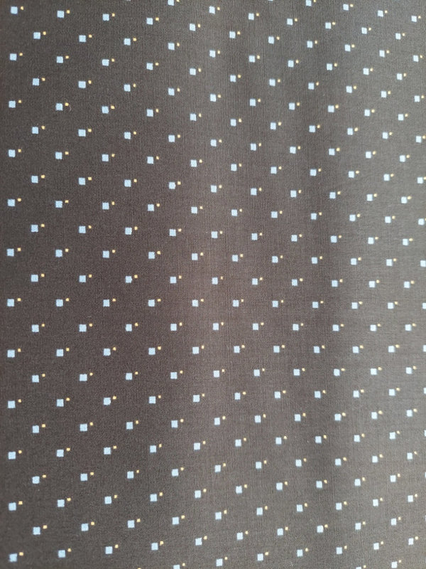 Baumwollstoff mit grafischem Muster auf schwarzem Hintergrund