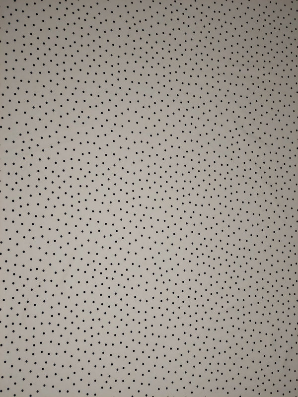 Baumwoll-Jersey mit dunkelblauen Punkten auf weißem Grund
