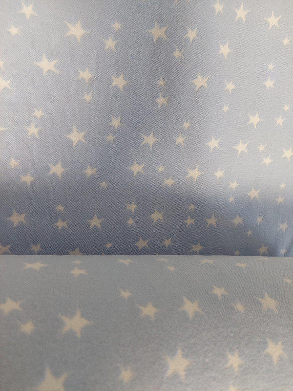 Jersey-Bündchen glatt weiße Sterne auf hellblauem Hintergrund